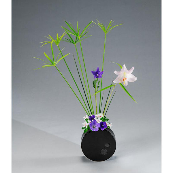 With a chic Takeo ware flower vase